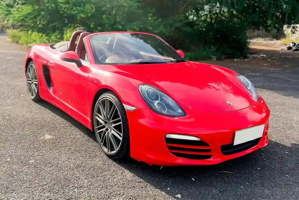Porsche Boxster merah, mobil sport convertible disewakan di Bali